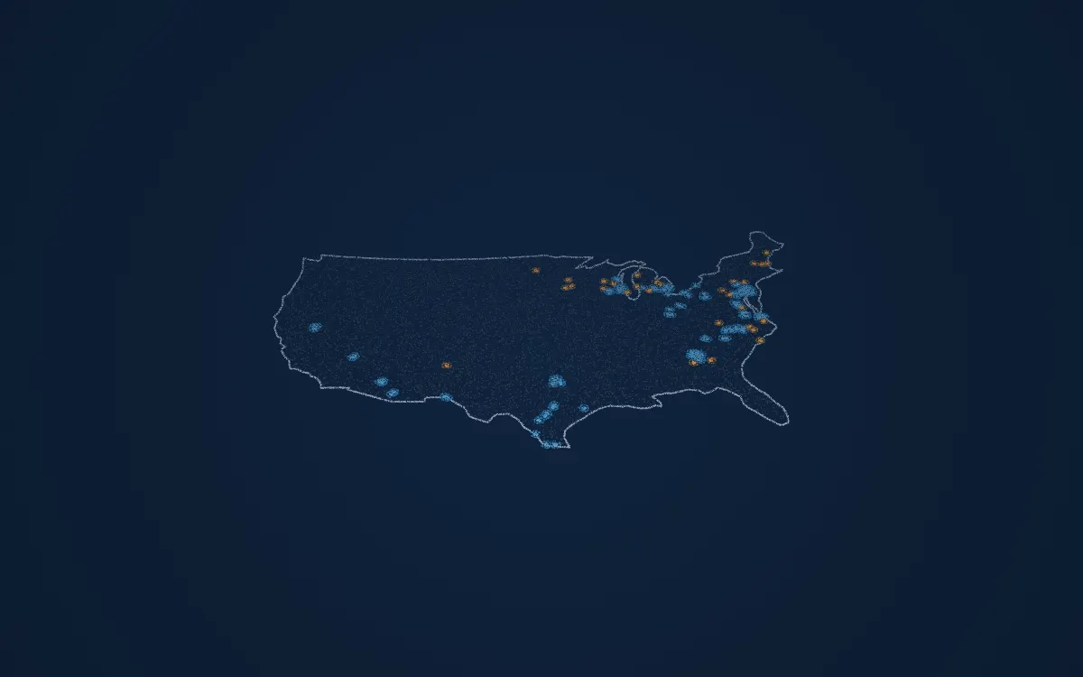 A map of the contiguous United States drawn in points: 132 blue points mark the governing bodies the system reads, and orange points mark its planned expansion.